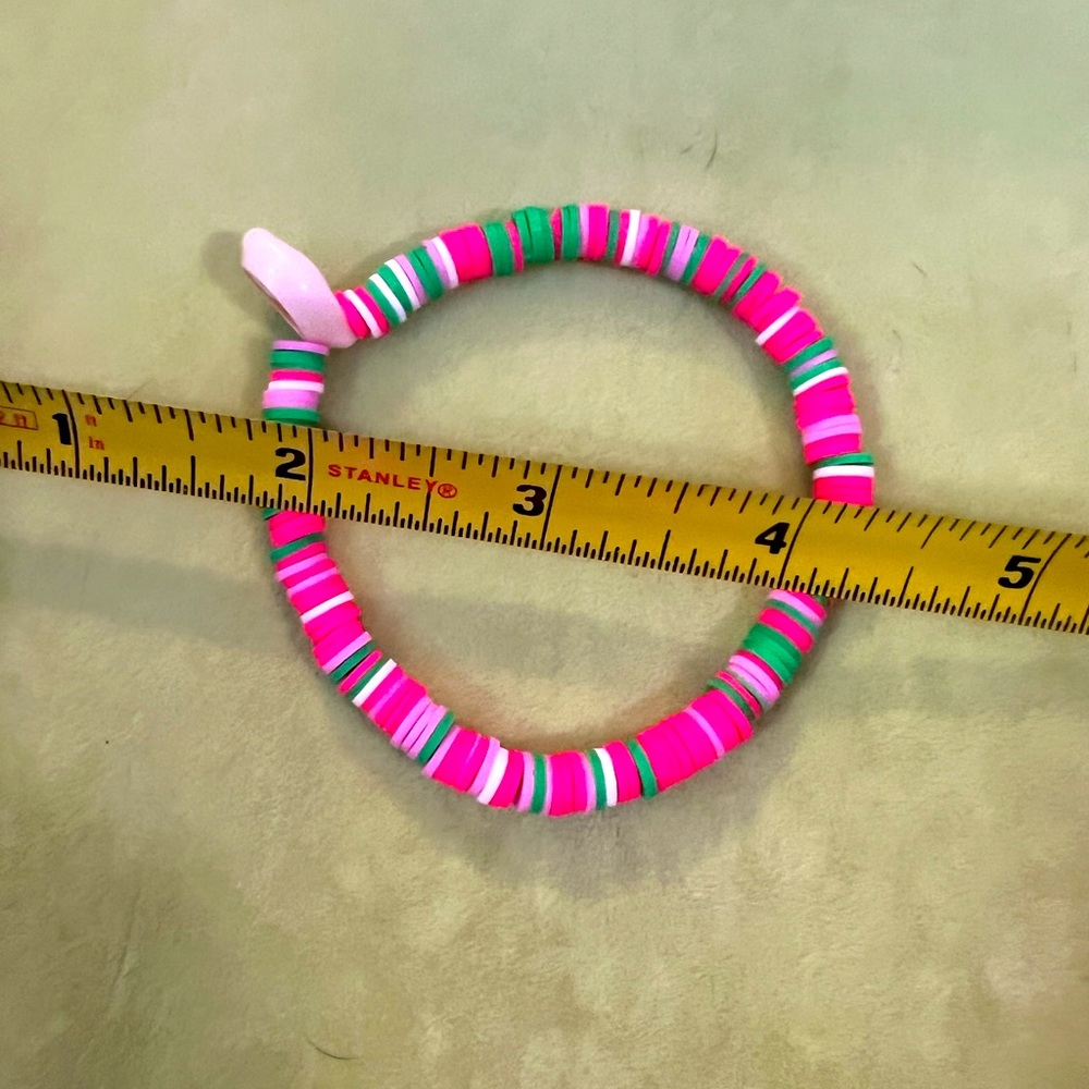 Bright color bead bracelet with seashell charm. Much love invested in crafting!